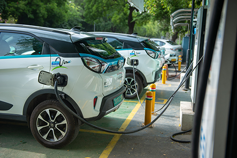 Electric vehicles at a charging station. 